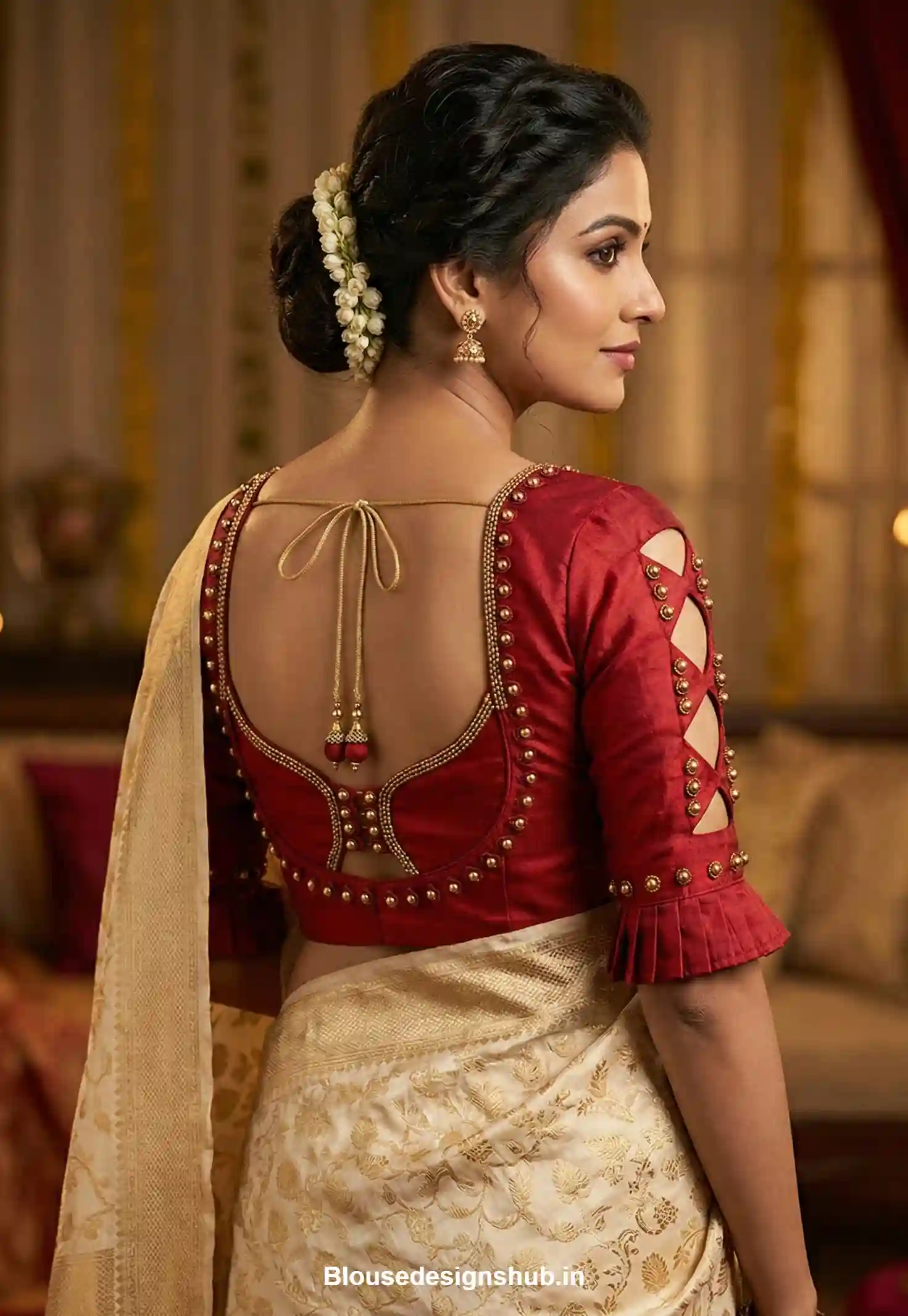 Elegant Red Blouse with Golden Bead Embroidery and Geometric Cutout Sleeves Design for Saree